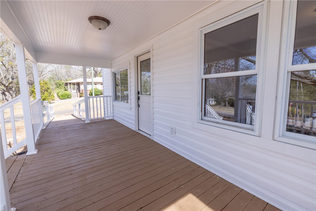 204 Old Salem Road Seneca, SC 29672 - Photo 4 of 28 This inviting covered porch provides a tranquil outdoor retreat.