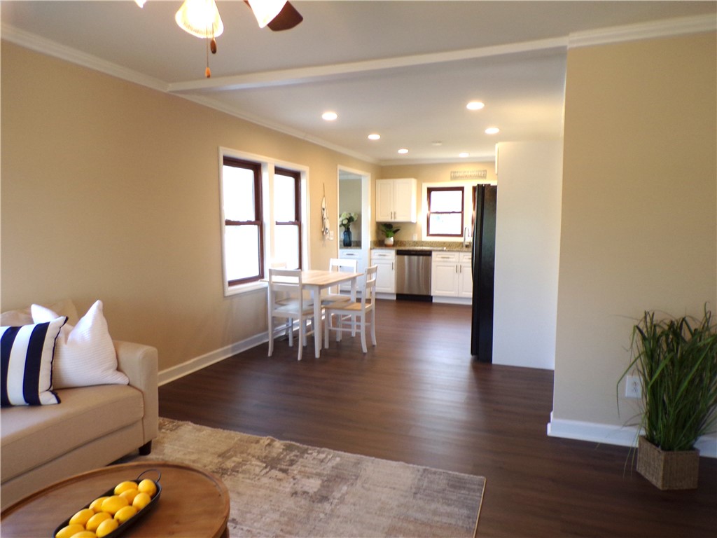 204 Old Salem Road Seneca, SC 29672 - Photo 7 of 28 This inviting space combines living and dining areas with a bright, open kitchen.
