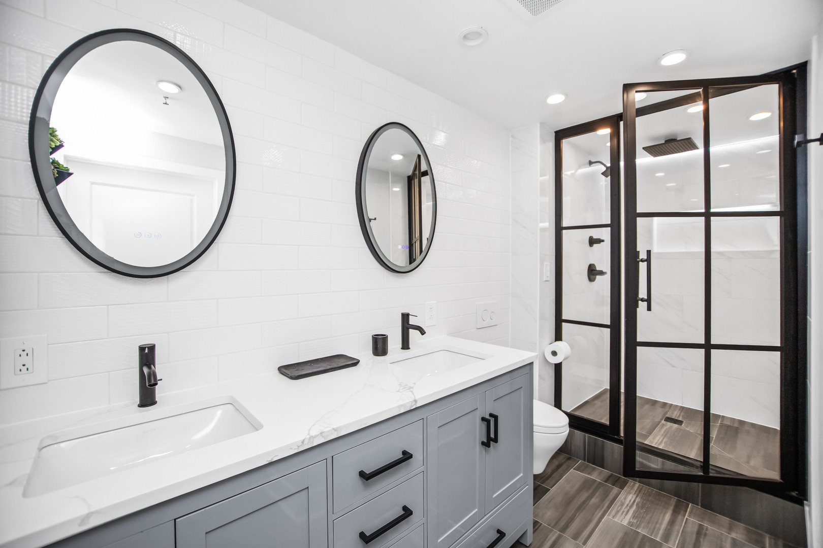 400 South Green Street, Unit 508 Chicago, IL 60607 - Photo 15 of 24 a bathroom with a double vanity sink and a mirror