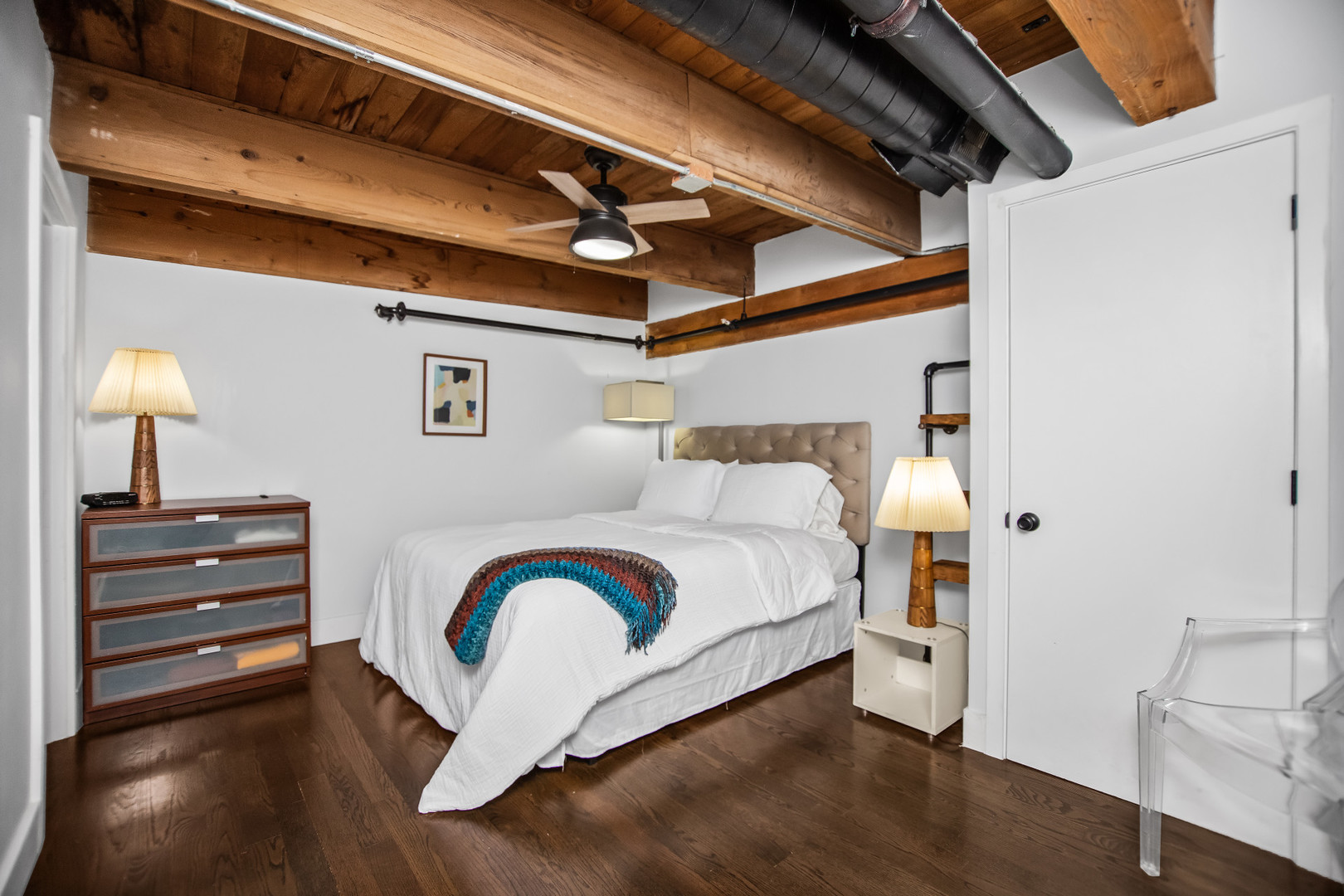 400 South Green Street, Unit 508 Chicago, IL 60607 - Photo 18 of 24 a bedroom with a bed and a chair