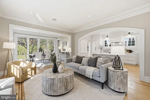 a front view of a house with a yard table and chairs