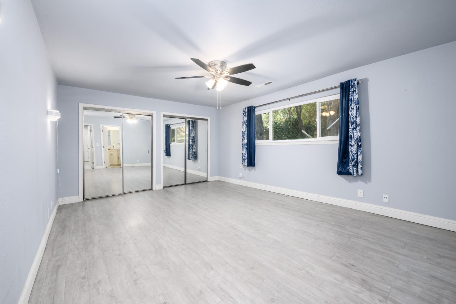 2873 Anderson Way Placerville, CA 95667 - Photo 14 of 24 a view of an empty room with window and wooden floor