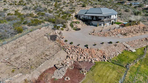 a view of a backyard of the house