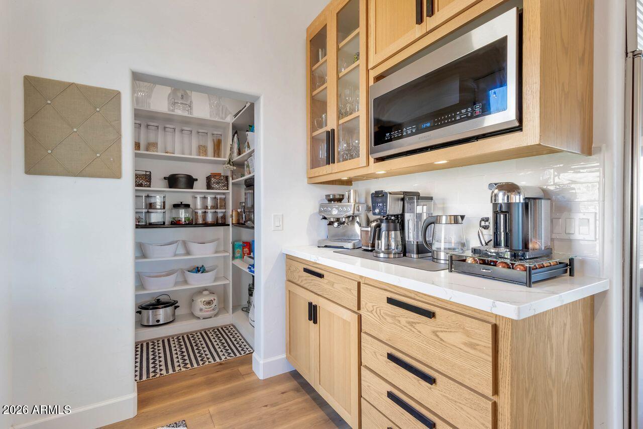 1605 North Page Springs Road Cornville, AZ 86325 - Photo 13 of 51 a kitchen with stainless steel appliances a sink and cabinets