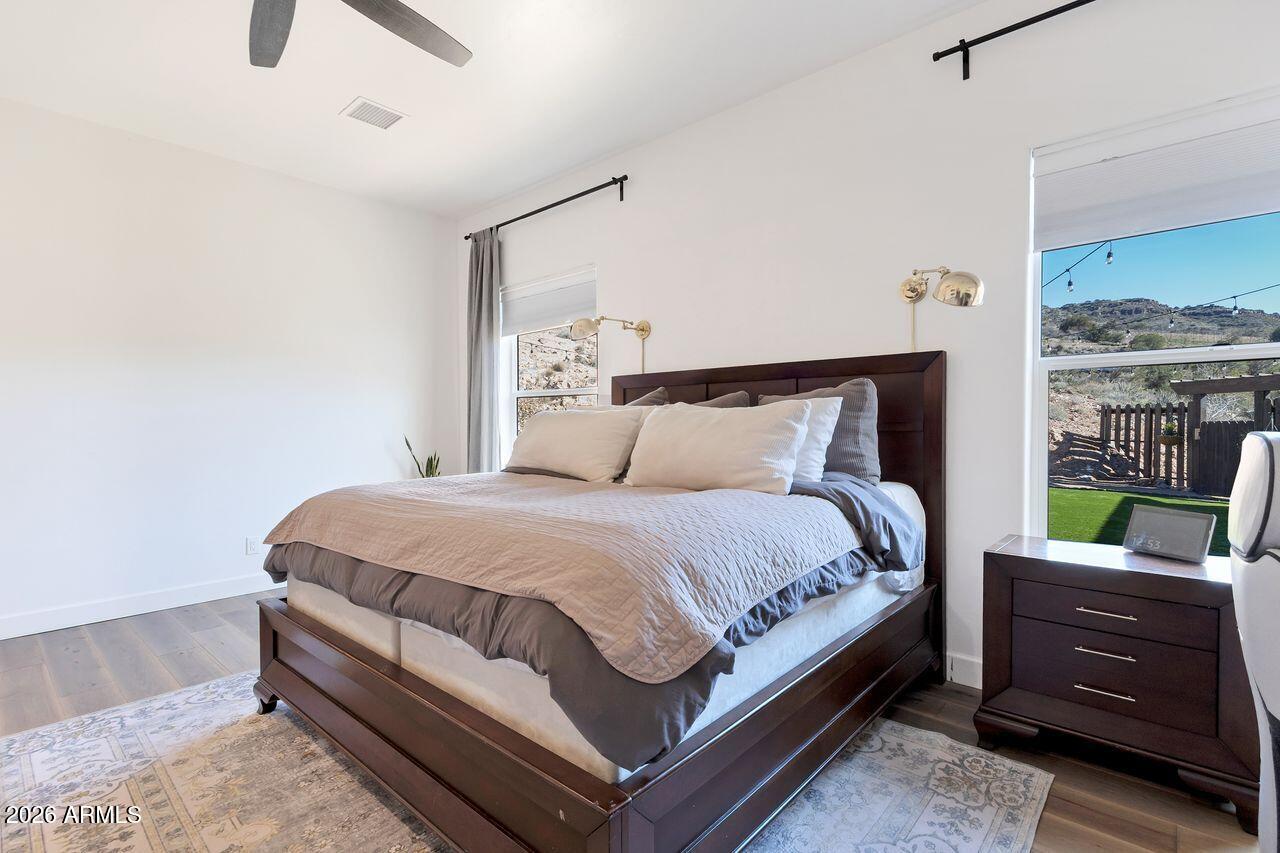 1605 North Page Springs Road Cornville, AZ 86325 - Photo 15 of 51 a bedroom with a bed and a dresser