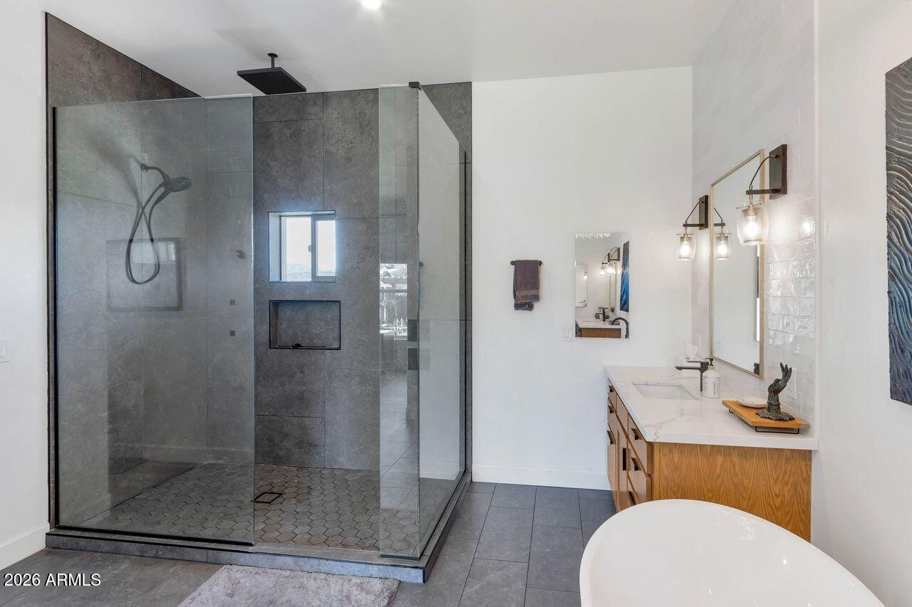 1605 North Page Springs Road Cornville, AZ 86325 - Photo 19 of 51 a bathroom with a toilet a sink and shower