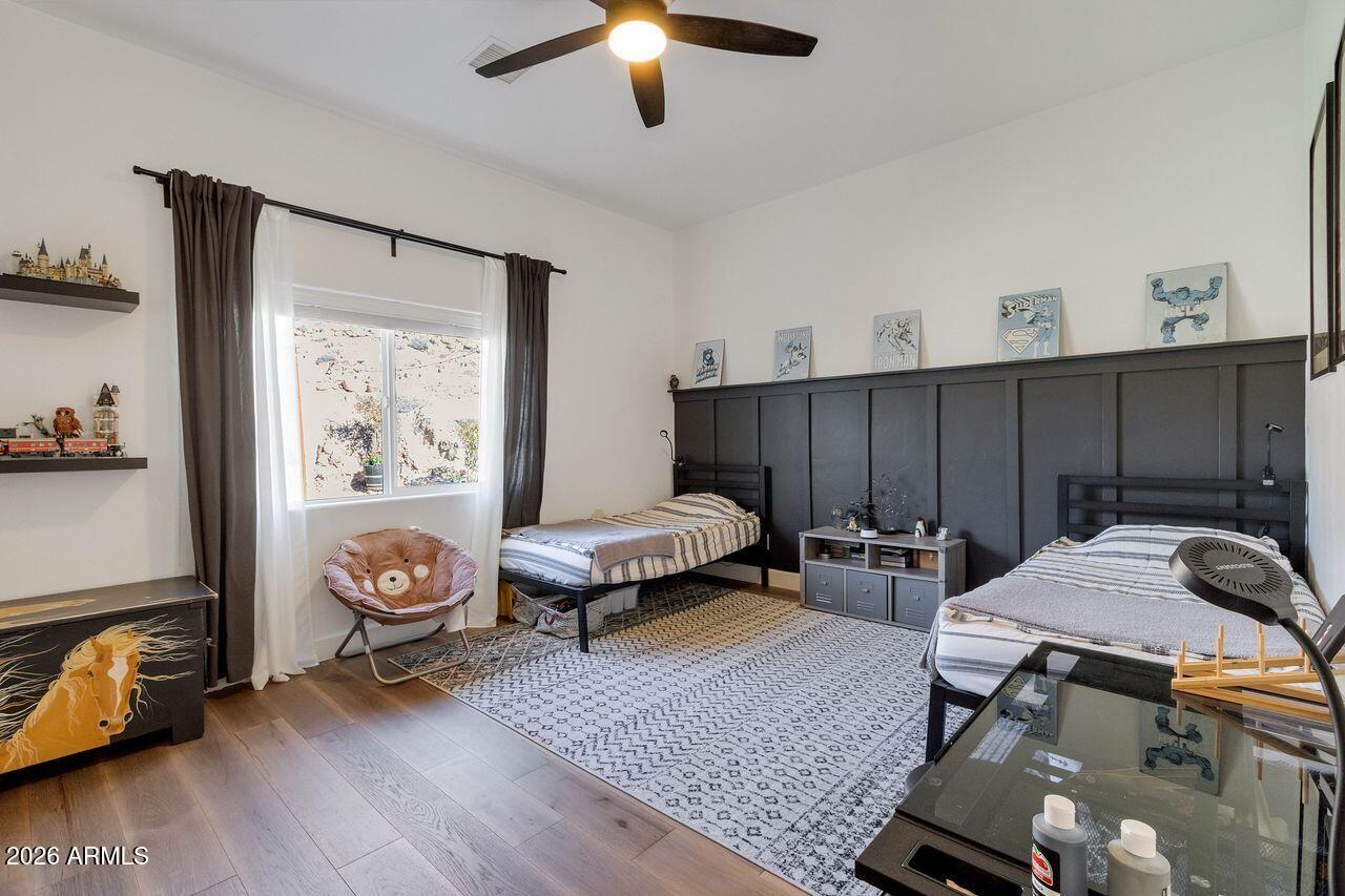 1605 North Page Springs Road Cornville, AZ 86325 - Photo 22 of 51 a bedroom with furniture and a window
