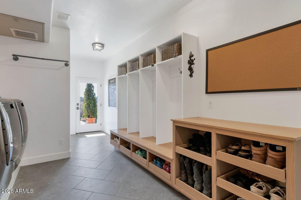 1605 North Page Springs Road Cornville, AZ 86325 - Photo 33 of 51 a room with furniture a washer and dryer