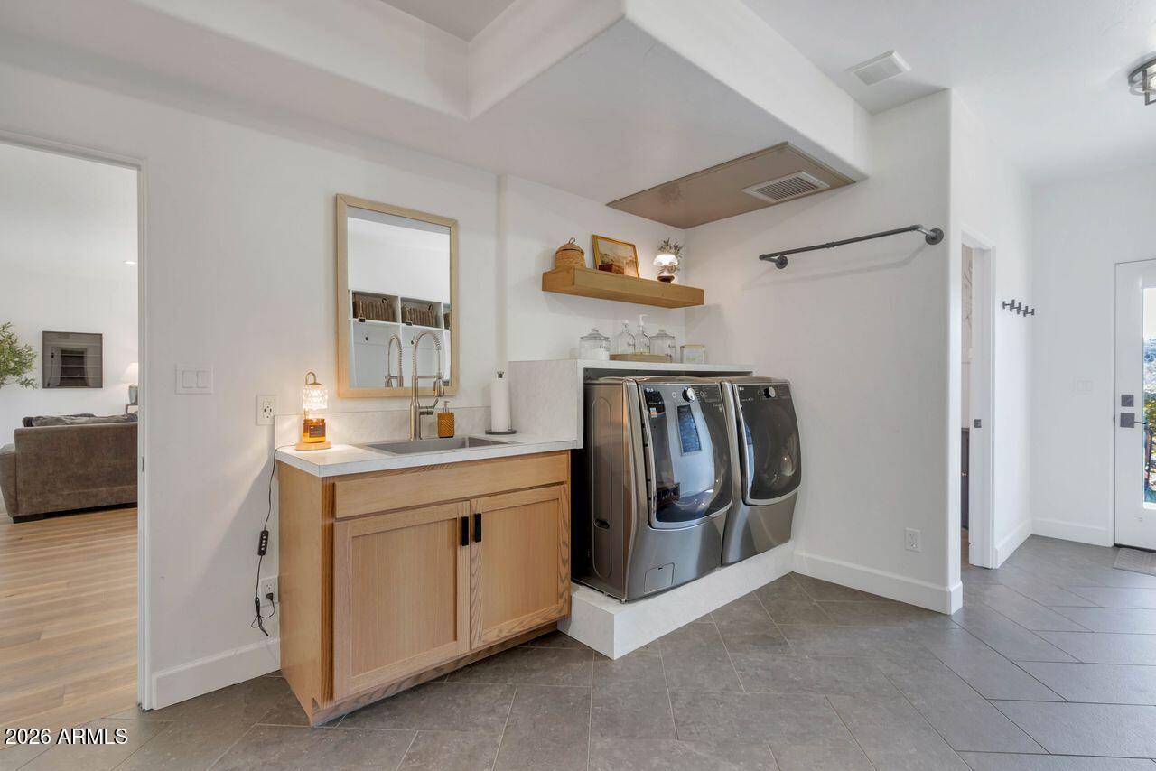 1605 North Page Springs Road Cornville, AZ 86325 - Photo 34 of 51 a kitchen with stainless steel appliances granite countertop a refrigerator and a stove