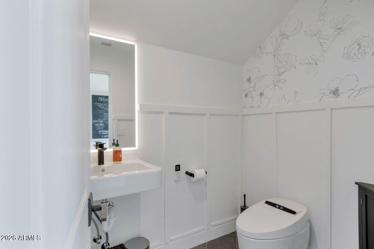 1605 North Page Springs Road Cornville, AZ 86325 - Photo 35 of 51 a bathroom with a sink a toilet and shower