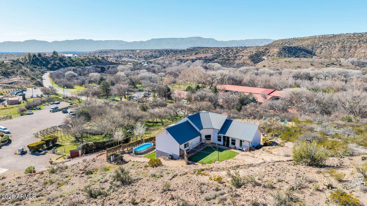 1605 North Page Springs Road Cornville, AZ 86325 - Photo 44 of 51 an aerial view of a house with a mountain