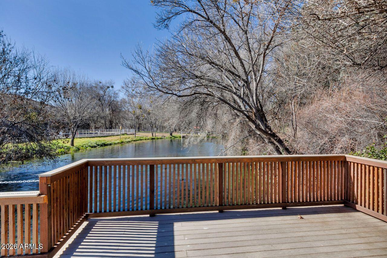 1605 North Page Springs Road Cornville, AZ 86325 - Photo 50 of 51 a view of a roof deck with wooden fence and floor