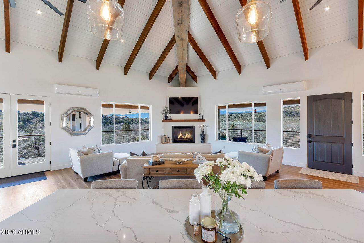 1605 North Page Springs Road Cornville, AZ 86325 - Photo 6 of 51 a living room with furniture fireplace and a flat screen tv
