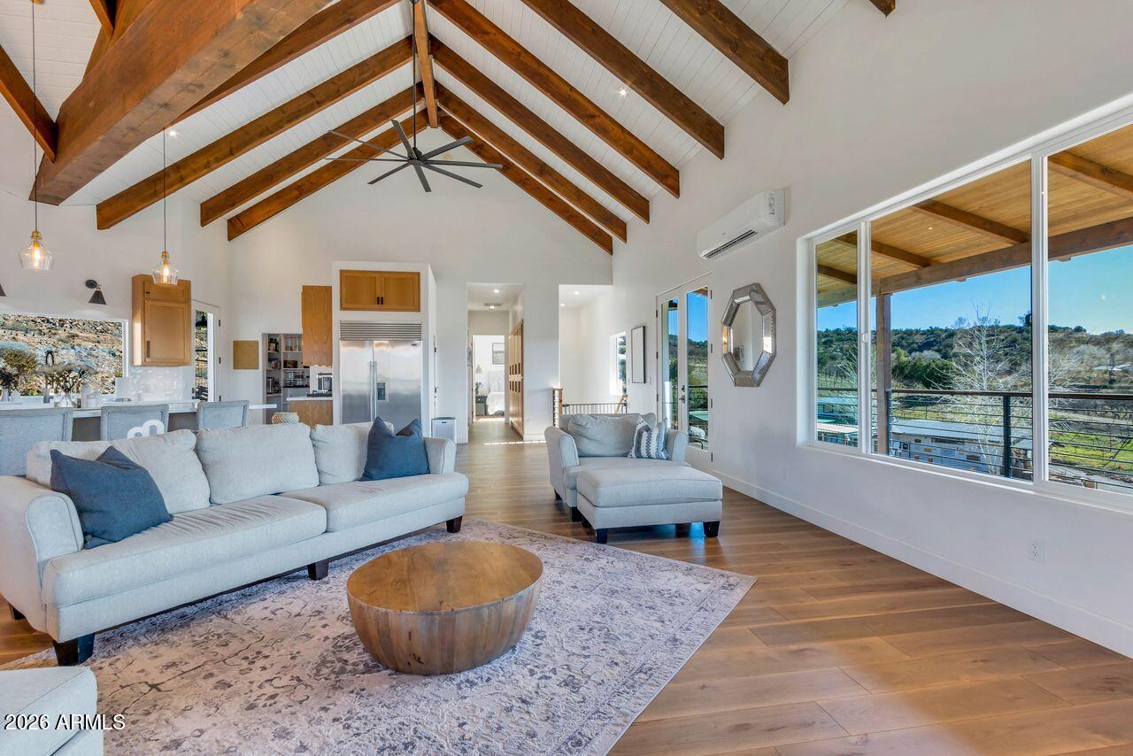1605 North Page Springs Road Cornville, AZ 86325 - Photo 7 of 51 a living room with furniture a rug and a large window