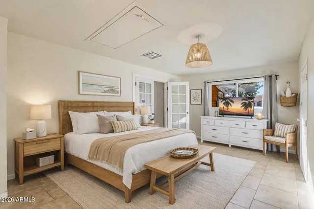 a kitchen with granite countertop a sink stove and cabinets