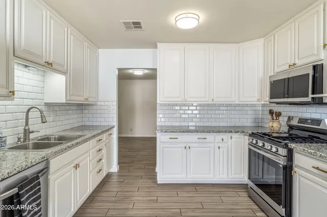 a view of a house with tree s