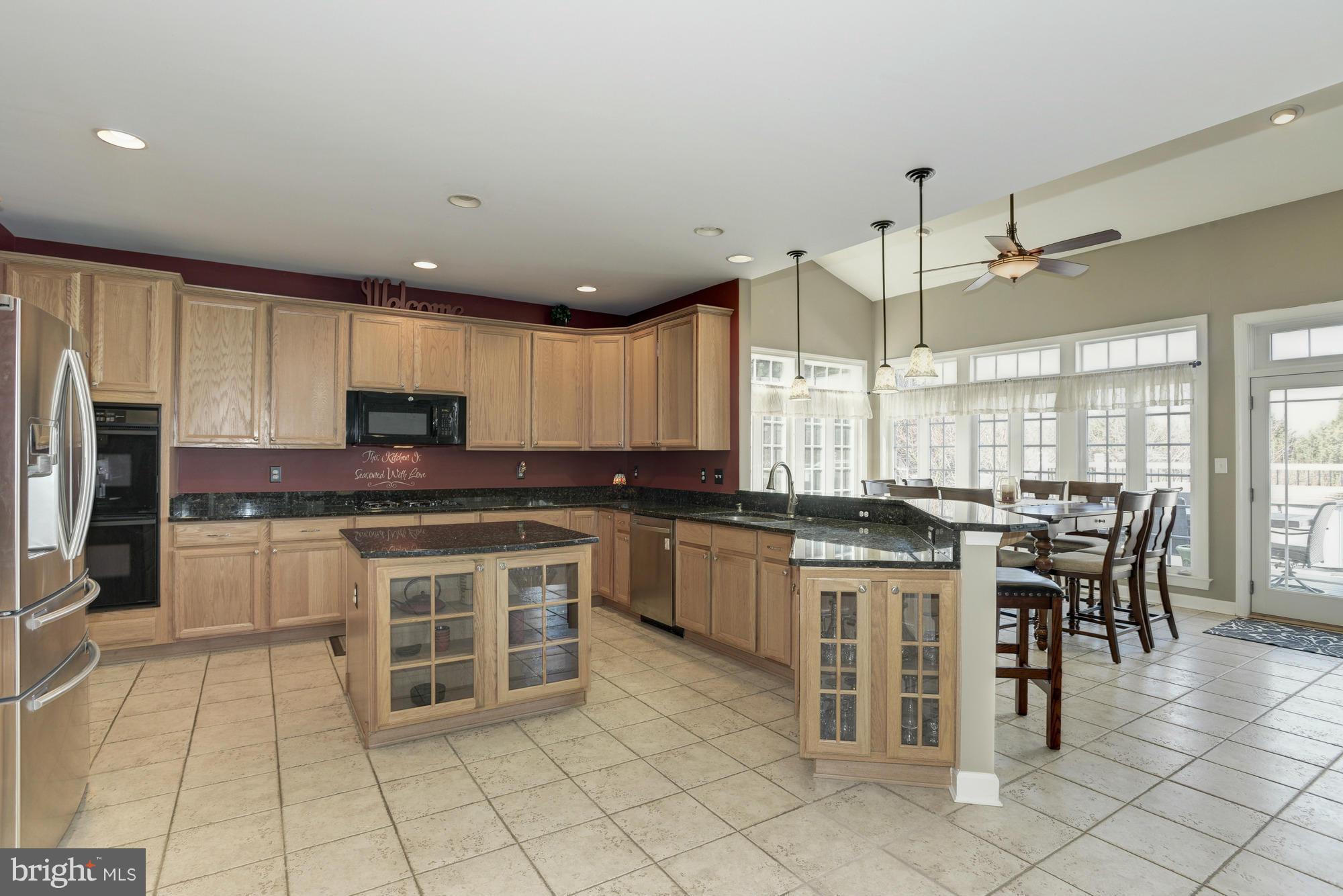 6 Chestnut Hill Road Forest Hill, MD 21050 - Photo 8 of 28 Kitchen with breakfast bar & Sunroom
