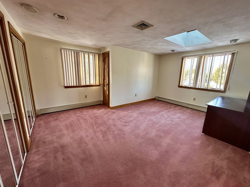 42 Pine Acres Road Foxboro, MA 02035 - Photo 26 of 40 an empty room with windows