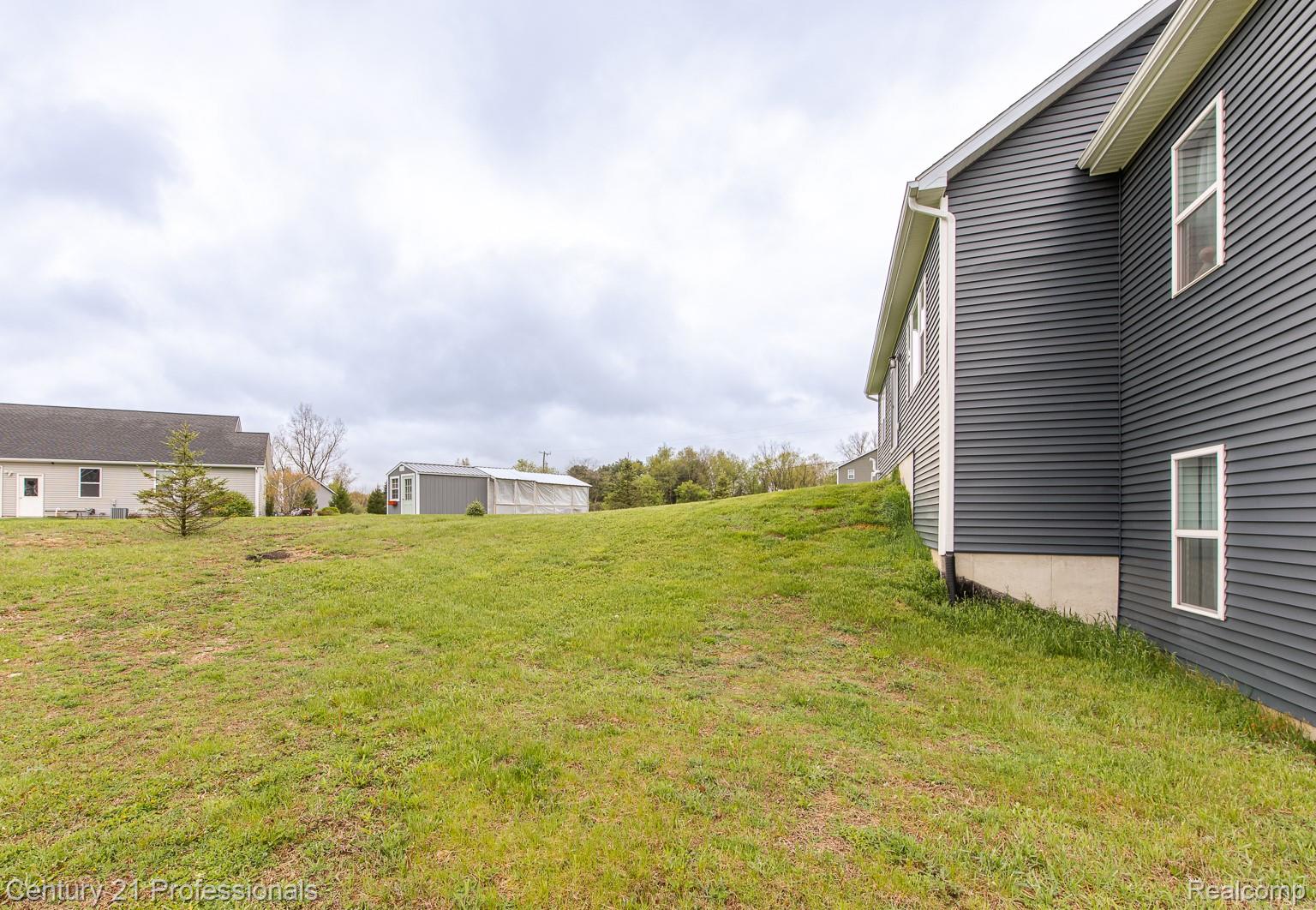 4914 TORATOLA Lane Howell, MI 48843 - Photo 37 of 39 View of grassy yard