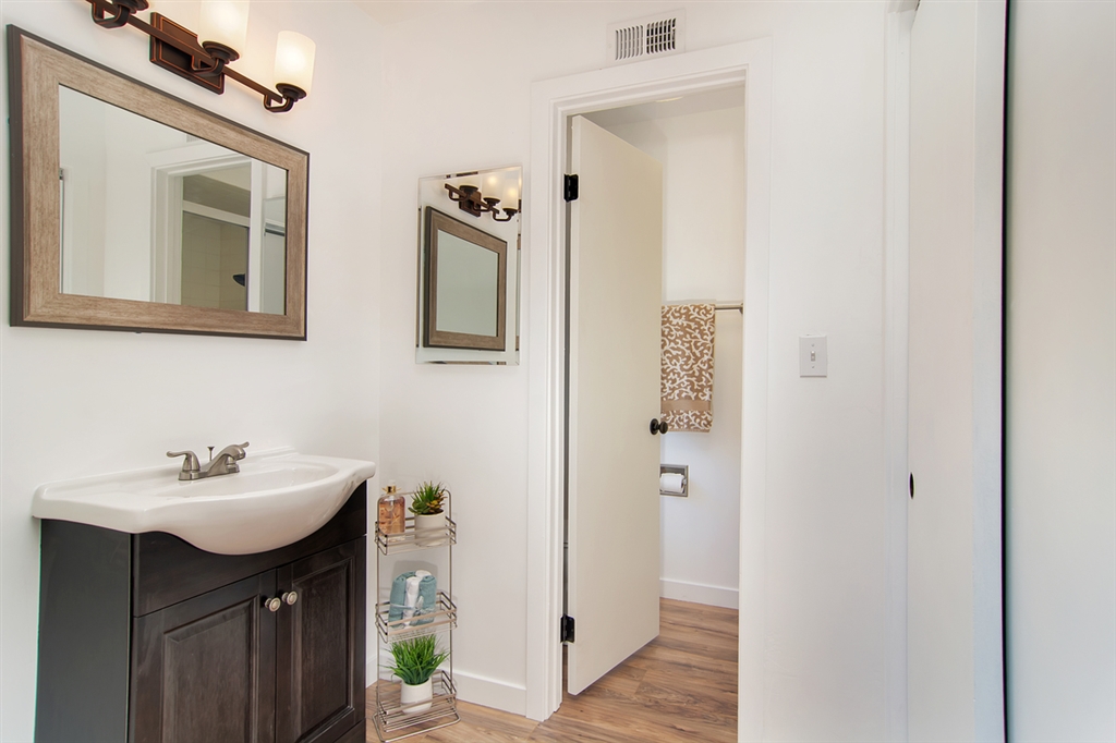 1939 Alga Road, Unit D Carlsbad, CA 92009 - Photo 16 of 25 The guest bathroom has an new vanity and a tub/shower.