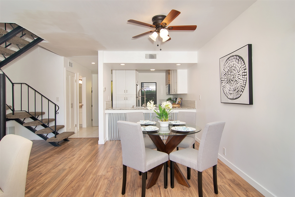 1939 Alga Road, Unit D Carlsbad, CA 92009 - Photo 3 of 25 Dining area with ceiling fan light fixture.