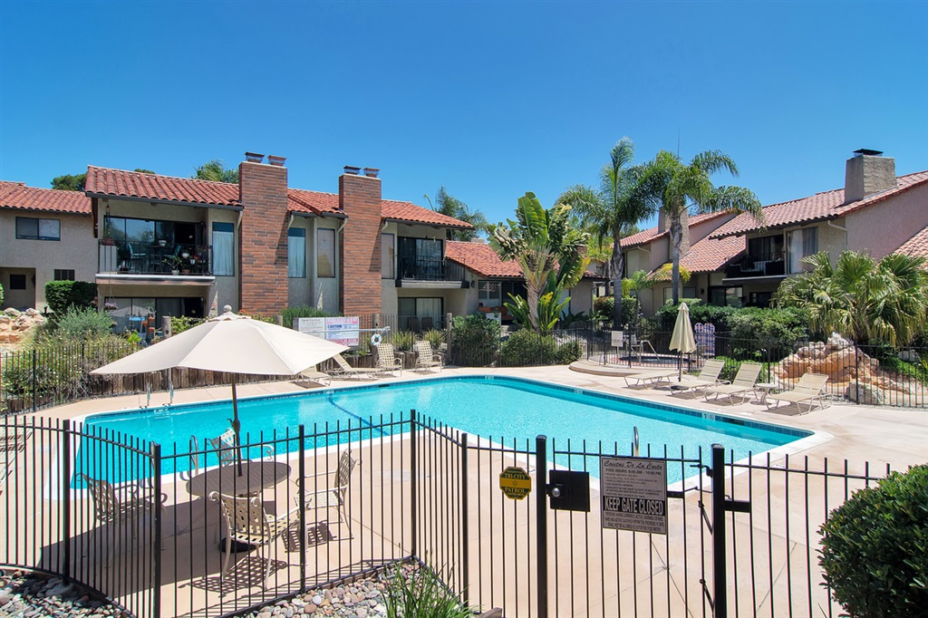 1939 Alga Road, Unit D Carlsbad, CA 92009 - Photo 21 of 25 The community pool is lovely with a spa and waterfall features.