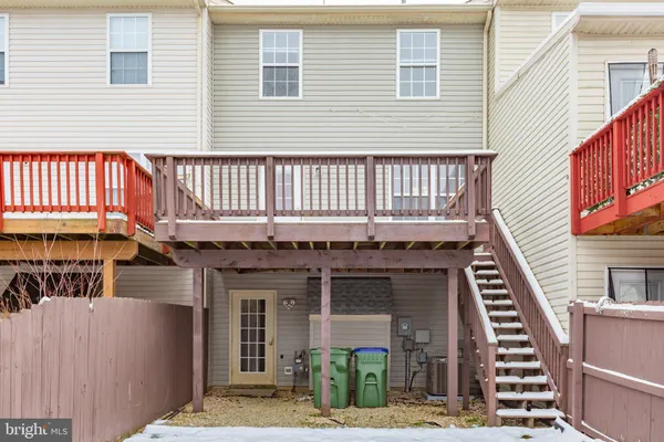 a front view of a house with stairs