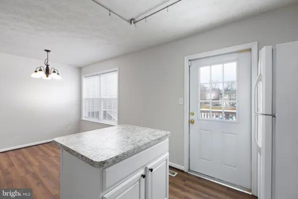 a view of kitchen and utility room
