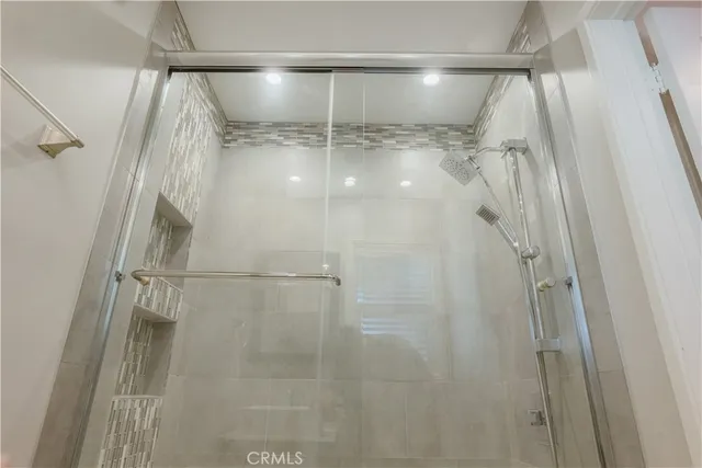 an empty room with wooden floor