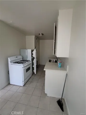 a utility room with washer and dryer