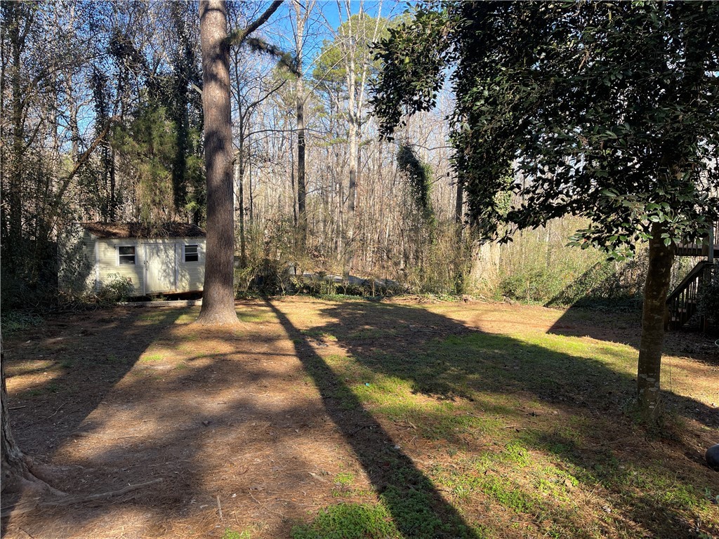 13011 Janda Road Seneca, SC 29672 - Photo 27 of 38 Backyard with Storage Bldg