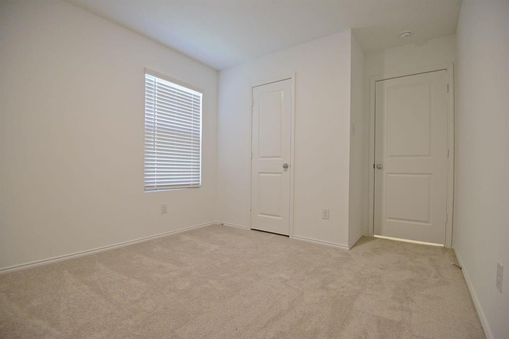 14133 Aberavon Drive Pilot Point, TX 76258 - Photo 12 of 18 an empty room with windows