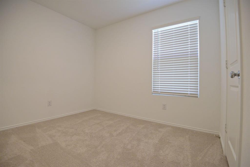 14133 Aberavon Drive Pilot Point, TX 76258 - Photo 13 of 18 an empty room with a window