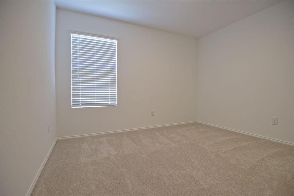 14133 Aberavon Drive Pilot Point, TX 76258 - Photo 10 of 18 an empty room with a window