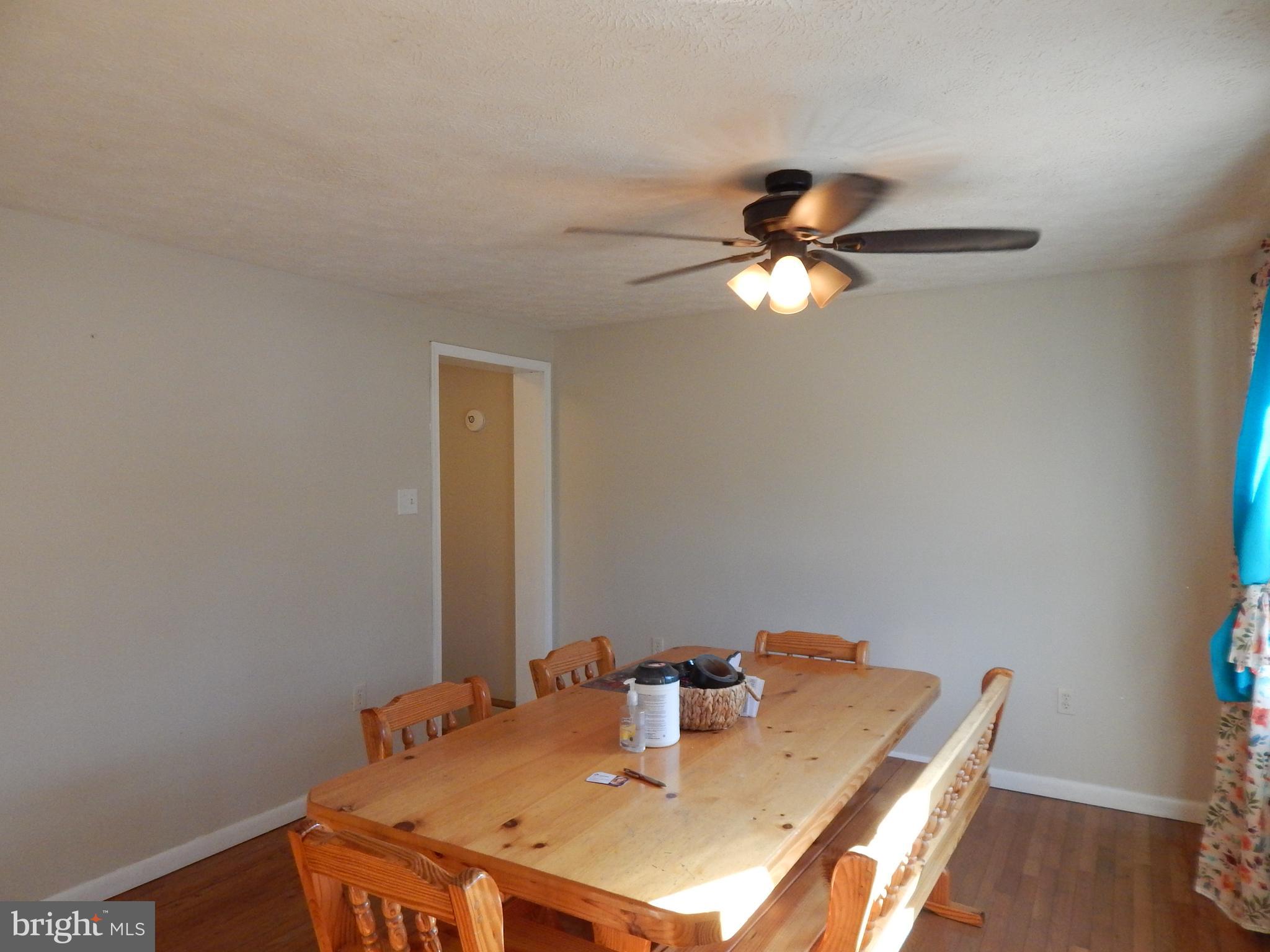 6285 Valley Road Berkeley Springs, WV 25411 - Photo 3 of 30 LIVING ROOM - currently being used as dining room