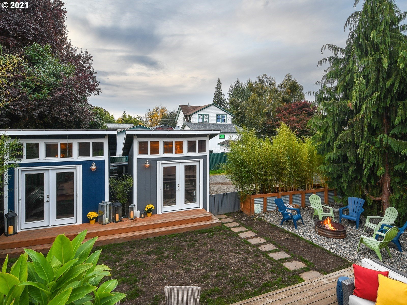 115 South 4th Avenue Ridgefield, WA 98642 - Photo 25 of 32 a view of a house with sitting area and garden