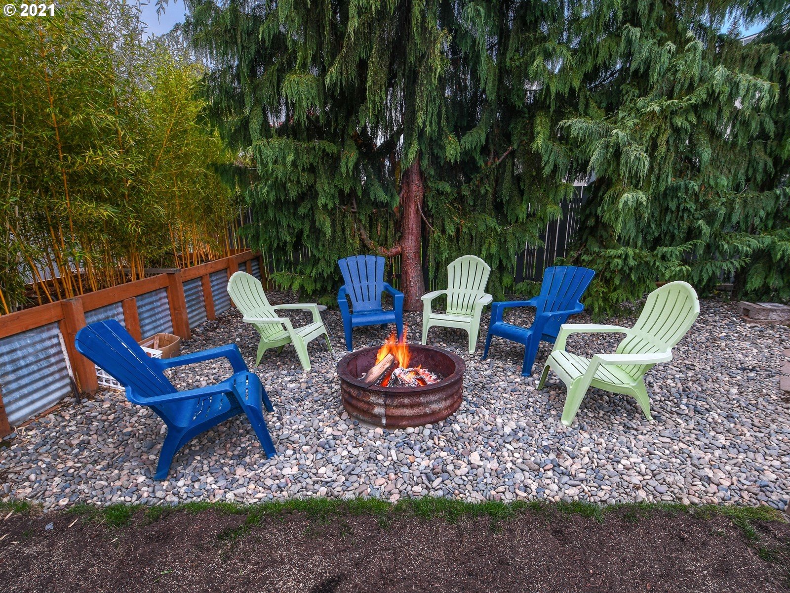 115 South 4th Avenue Ridgefield, WA 98642 - Photo 27 of 32 a view of a backyard with plants and outdoor seating