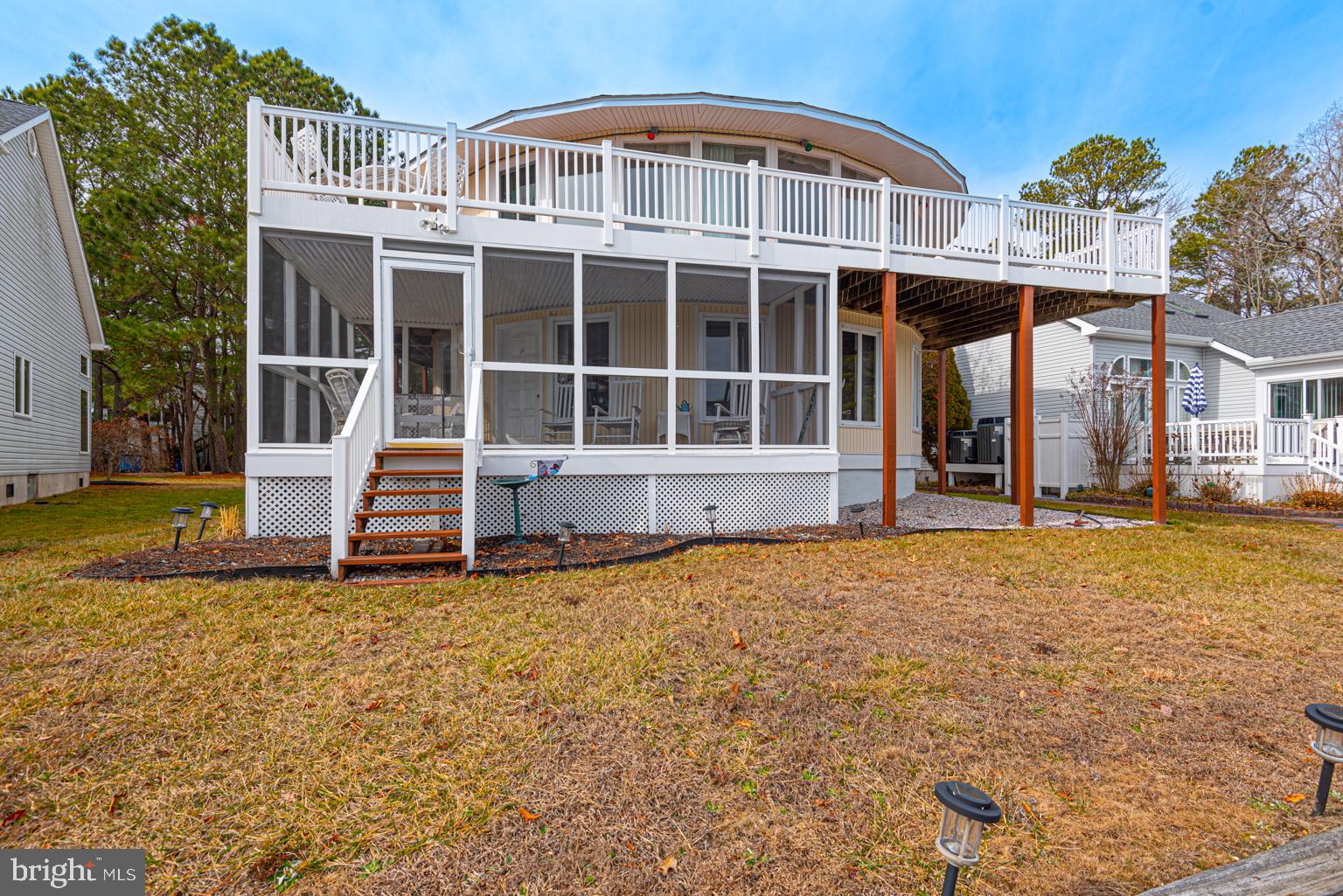 116 Watertown Road Ocean Pines, MD 21811 - Photo 11 of 78 a front view of a house with a yard