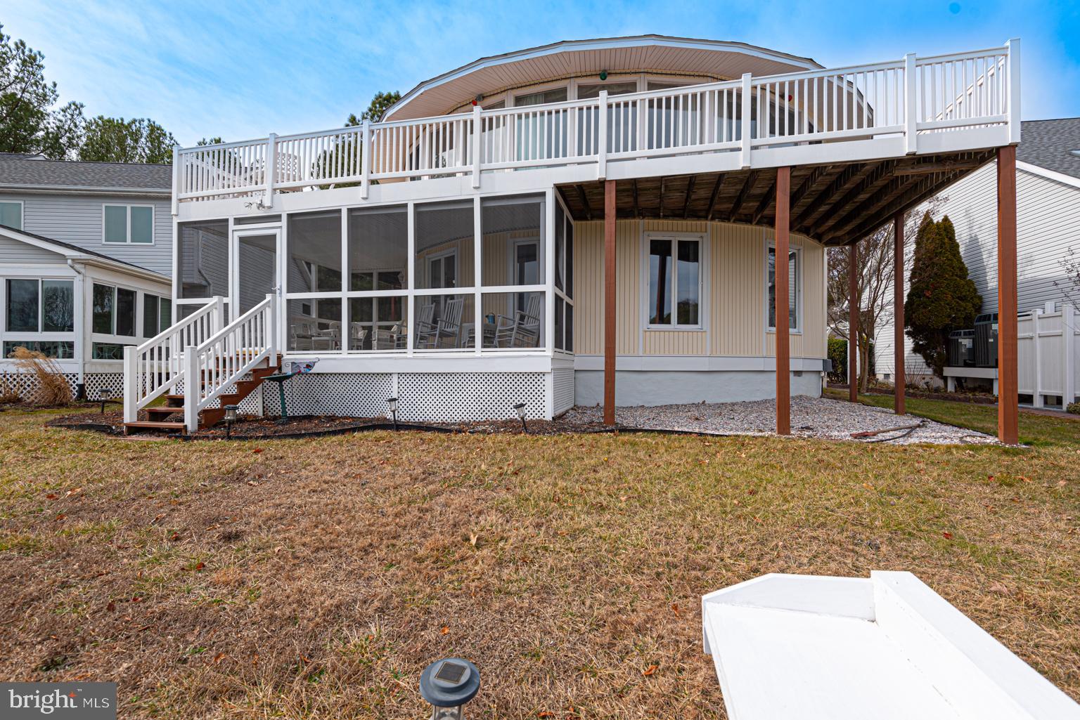 116 Watertown Road Ocean Pines, MD 21811 - Photo 13 of 78 a front view of a house with garden