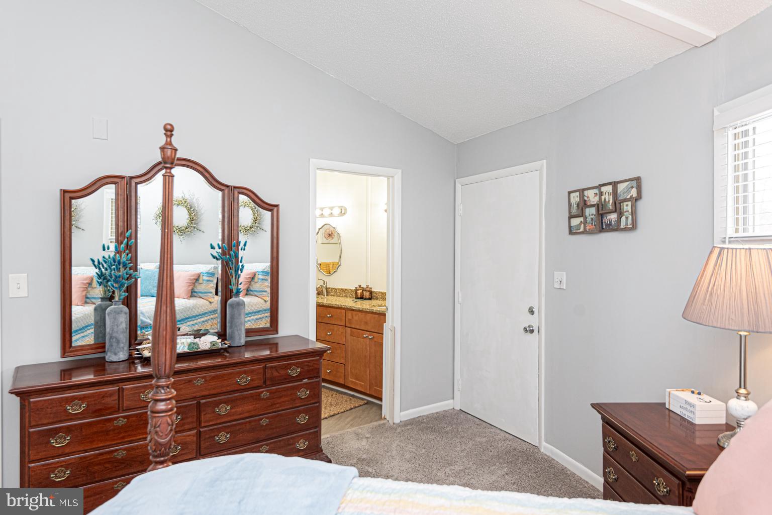 116 Watertown Road Ocean Pines, MD 21811 - Photo 37 of 78 a living room with furniture and a window