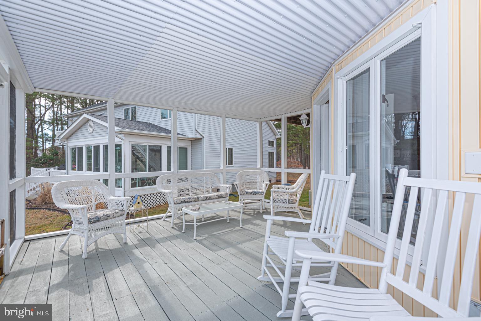 116 Watertown Road Ocean Pines, MD 21811 - Photo 54 of 78 a view of house with deck outdoor seating and kitchen view