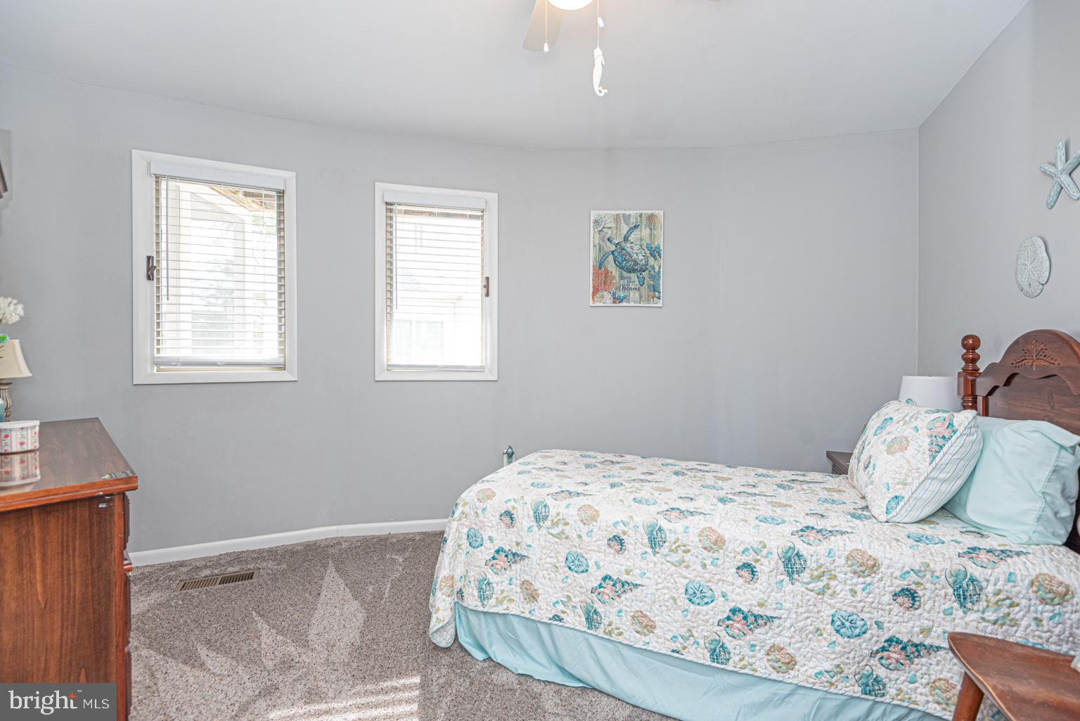 116 Watertown Road Ocean Pines, MD 21811 - Photo 58 of 78 a bedroom with a bed and a window