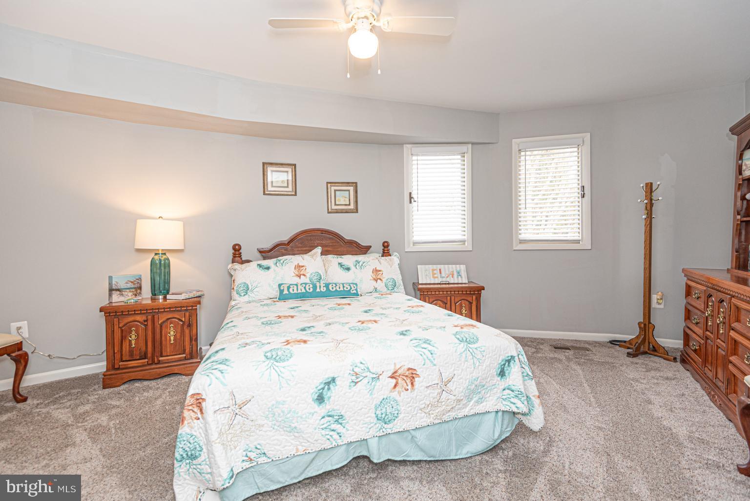 116 Watertown Road Ocean Pines, MD 21811 - Photo 64 of 78 a bedroom with a bed and a table
