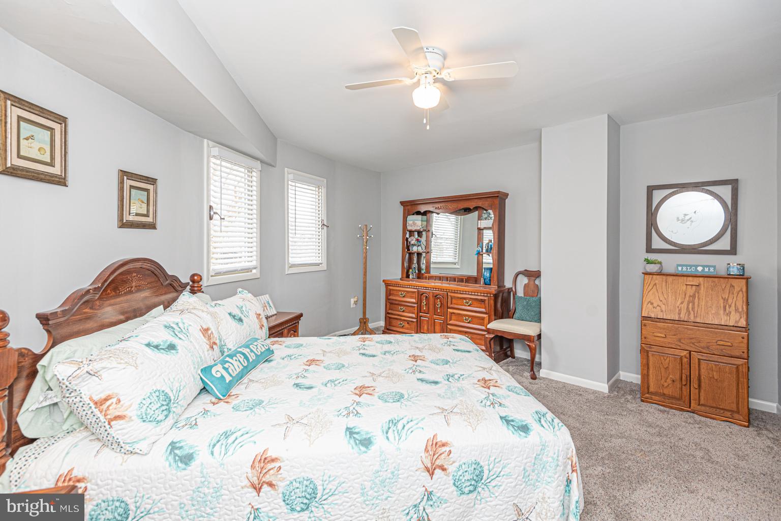 116 Watertown Road Ocean Pines, MD 21811 - Photo 67 of 78 a bedroom with a bed and dresser with mirror