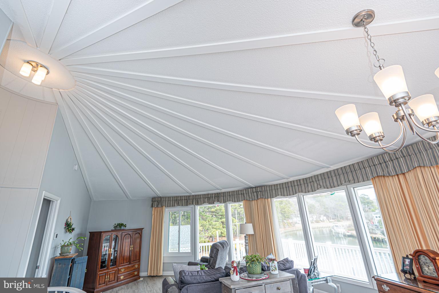 116 Watertown Road Ocean Pines, MD 21811 - Photo 71 of 78 a room with furniture and large windows