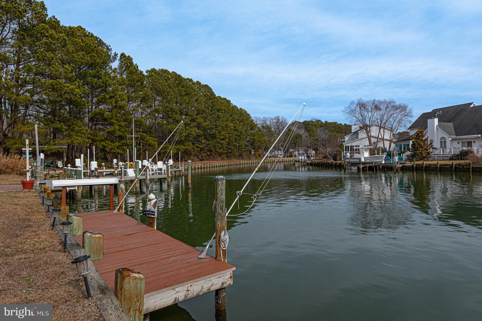 116 Watertown Road Ocean Pines, MD 21811 - Photo 10 of 78 a view of a lake with a table and chairs