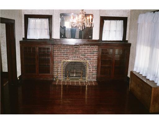 3968 Brandon Road Brighton Heights, PA 15212 - Photo 2 of 18 Living Room. BUILT IN BOOKCASES, ORIGINAL WOODWORK , DECORATIVE FIREPLACE AND EXPOSED HARDWOOD FLOORING.