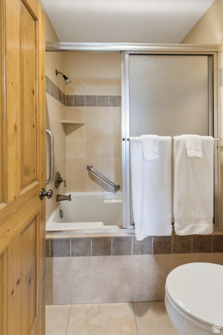 755 South Zion Ridge Drive Orderville, UT 84758 - Photo 62 of 84 Bathroom with tiled shower / bath combo and light tile patterned floors