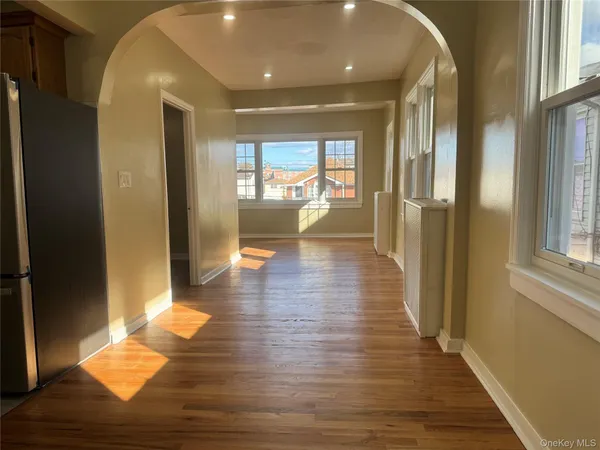 a view of entryway with wooden floor