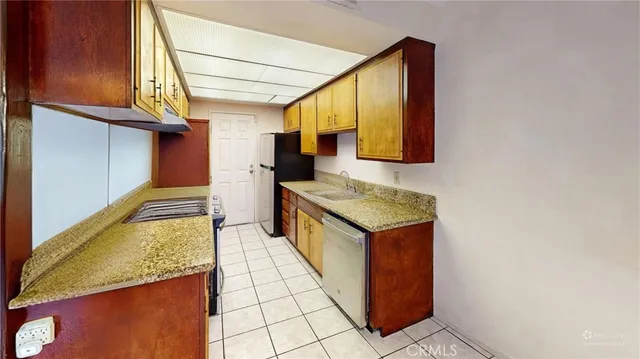 a view of a hallway with entryway door